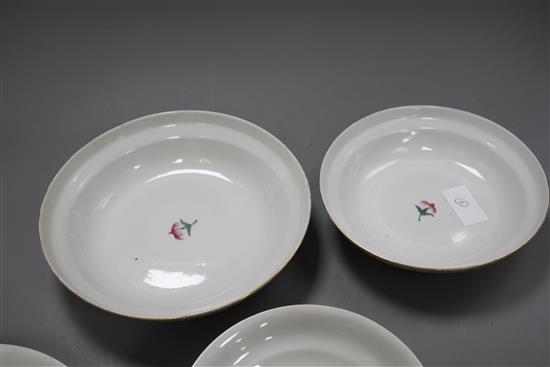 Two graduated Chinese famille rose bowls and cover, 20th century, each decorated with inscriptions and bearing red four character marks